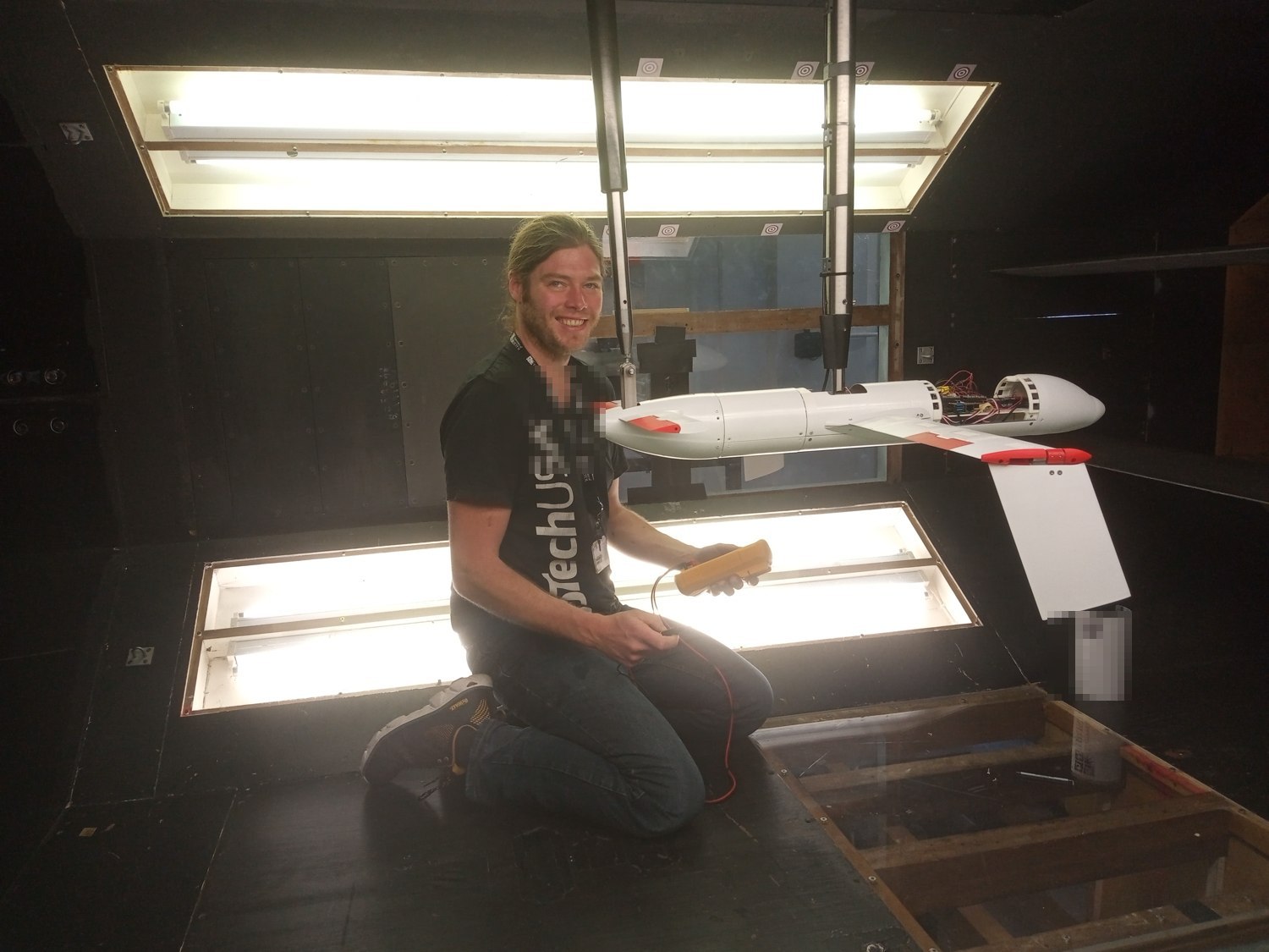 A bespoke aero test rig set up in a wind tunnel — a UAV mounted and instrumented for measurement